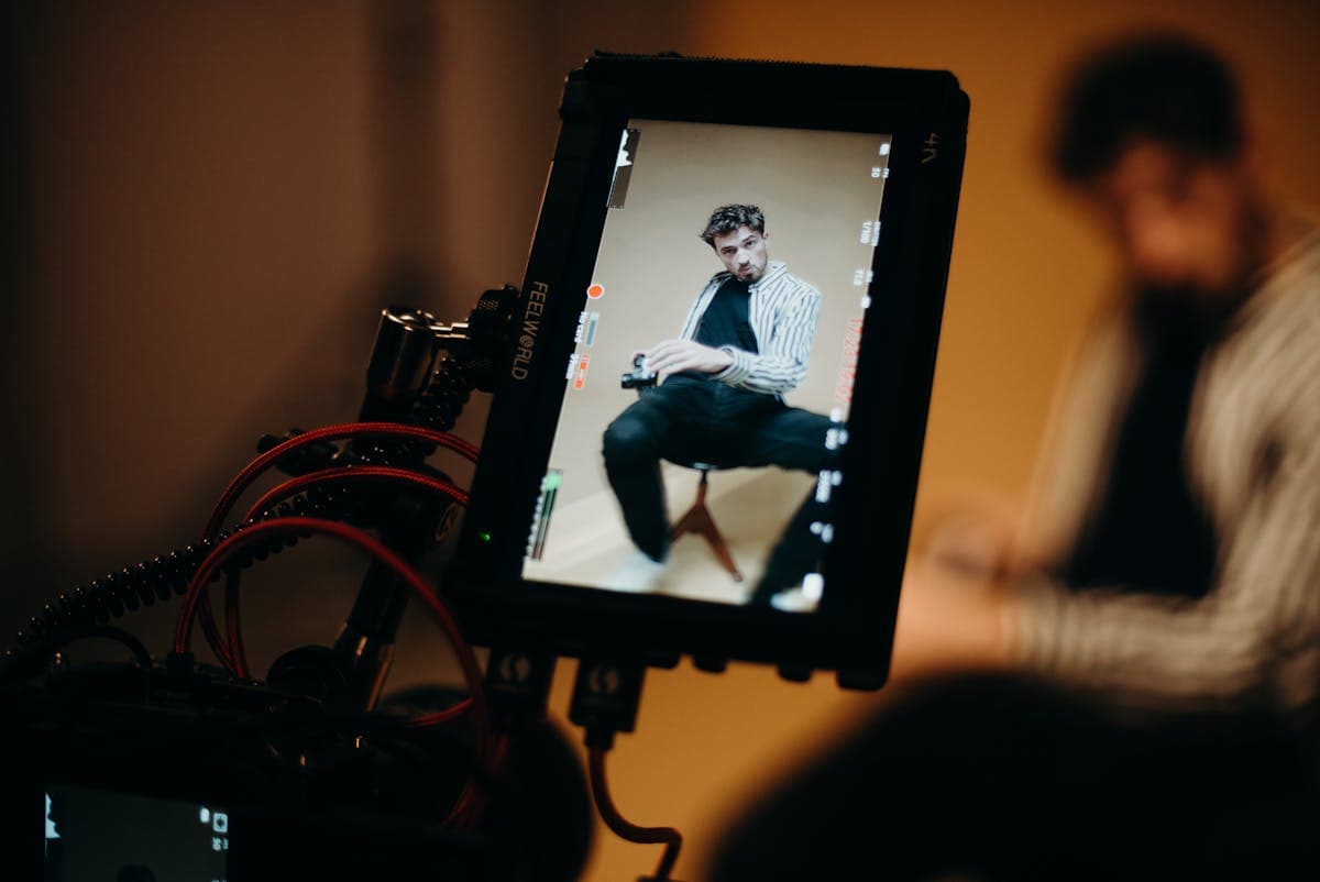 Person being recorded on screen demonstrating a workflow for AI agent training
